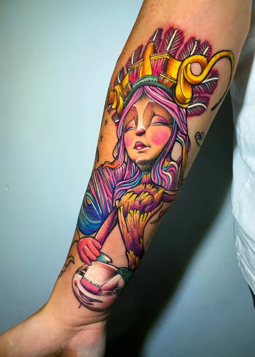 tattoo acuarela de un dibujo animado en el antebrazo