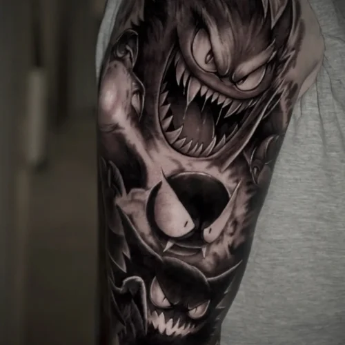 Tatuaje pokemon realista en el brazo