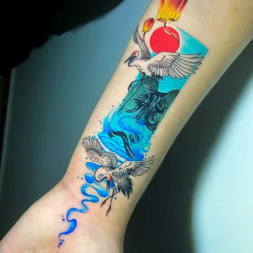 tatuajes de cover up estilo japones en el antebrazo