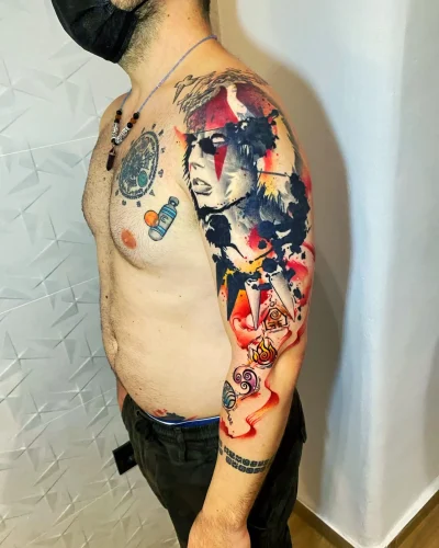 tatuaje cover up en el brazo